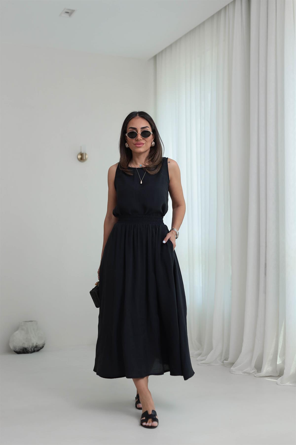 3510 Tencel Kumaş Sıfır Kol Bluz & Kloş Etekli Takım SİYAH