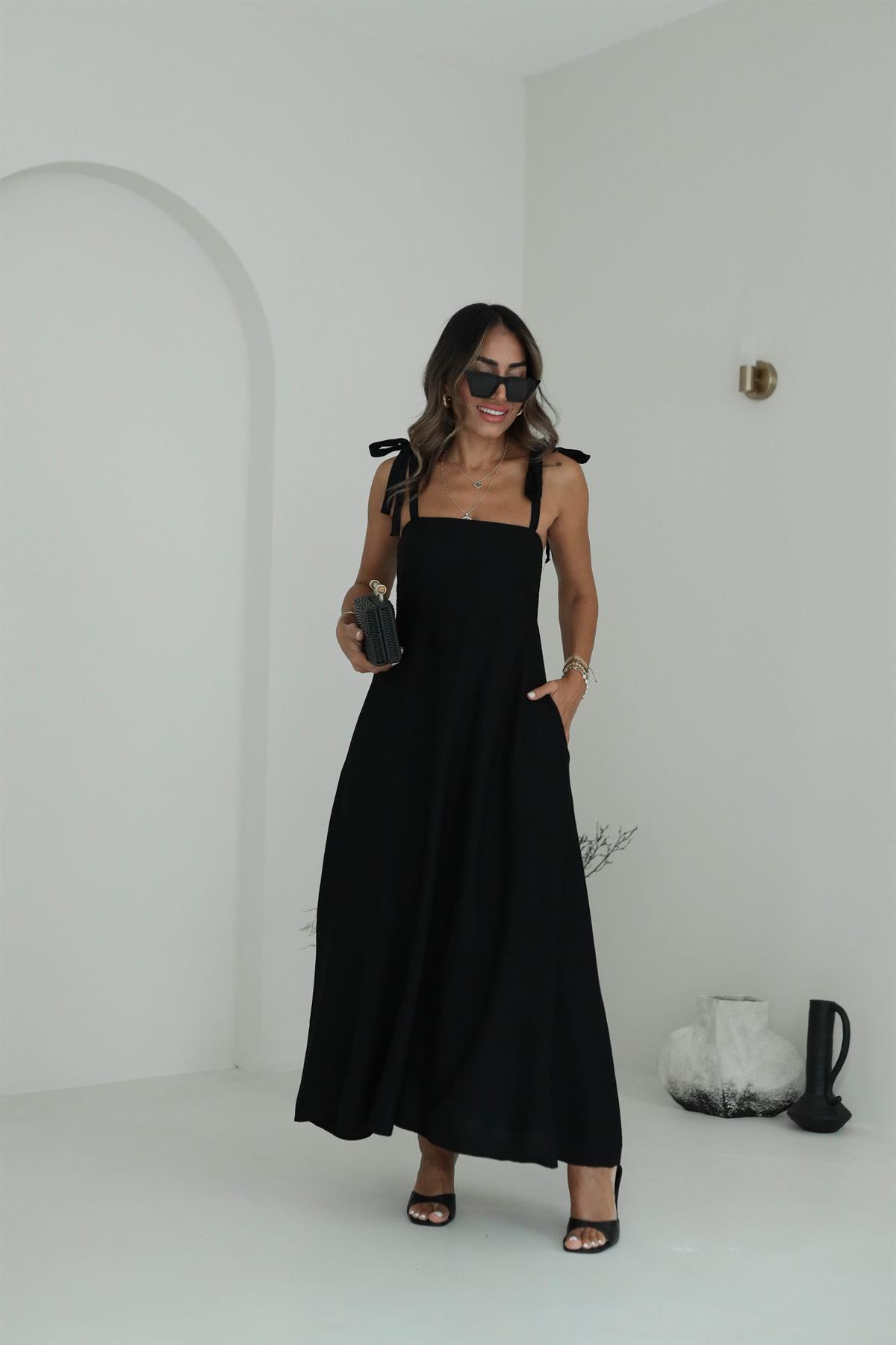 9106 Gipeli Askılı Dokuma Çan Elbise