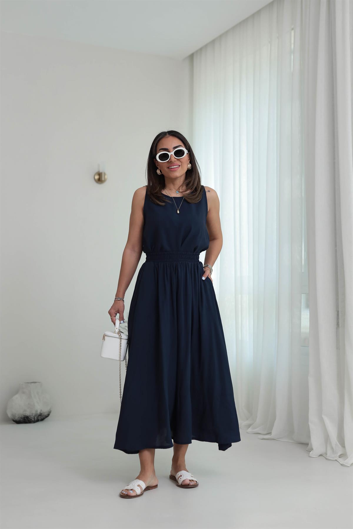 3510 Tencel Kumaş Sıfır Kol Bluz & Kloş Etekli Takım LACİVERT