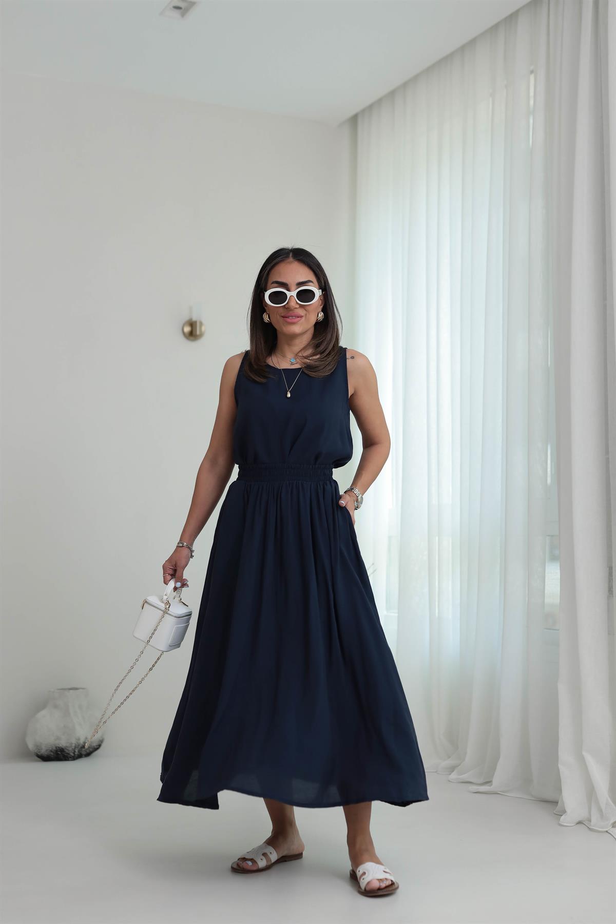 3510 Tencel Kumaş Sıfır Kol Bluz & Kloş Etekli Takım LACİVERT