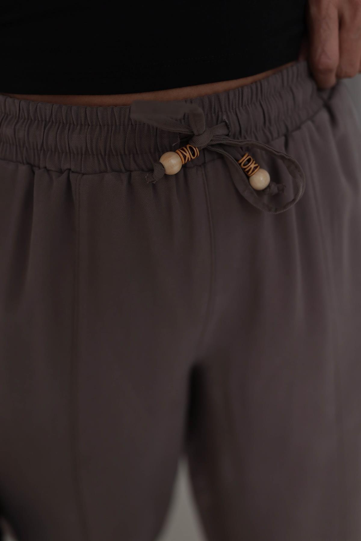 6703 Bel Lastikli Tencel Dokulu Boncuklu Pantolon KAHVE