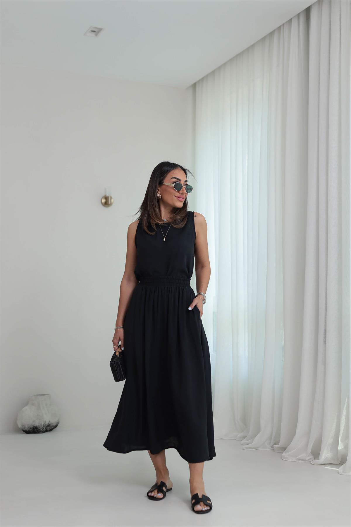 3510 Tencel Kumaş Sıfır Kol Bluz & Kloş Etekli Takım SİYAH