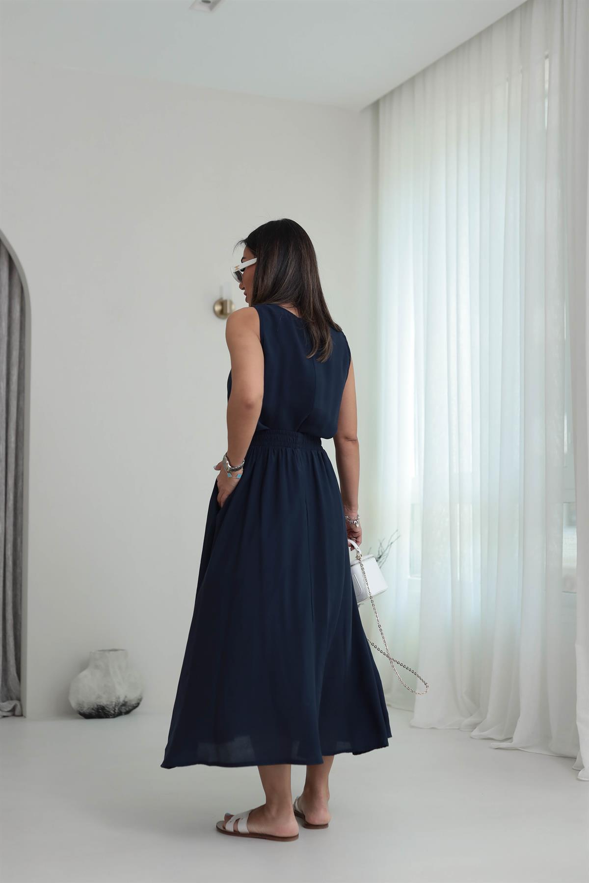 3510 Tencel Kumaş Sıfır Kol Bluz & Kloş Etekli Takım LACİVERT