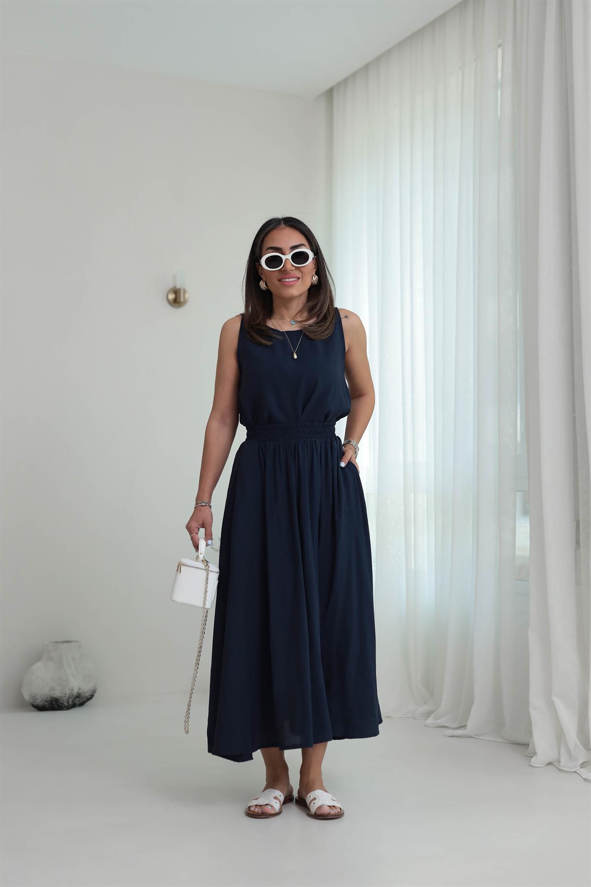 3510 Tencel Kumaş Sıfır Kol Bluz & Kloş Etekli Takım LACİVERT