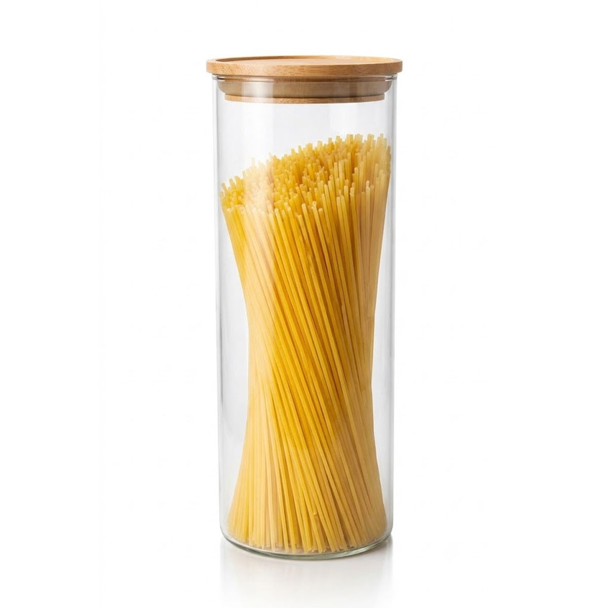 Çamlıca Home bambu kapaklı, silindir tasarımlı, içinde spagetti makarna bulunan büyük boy şeffaf cam saklama kavanozu.