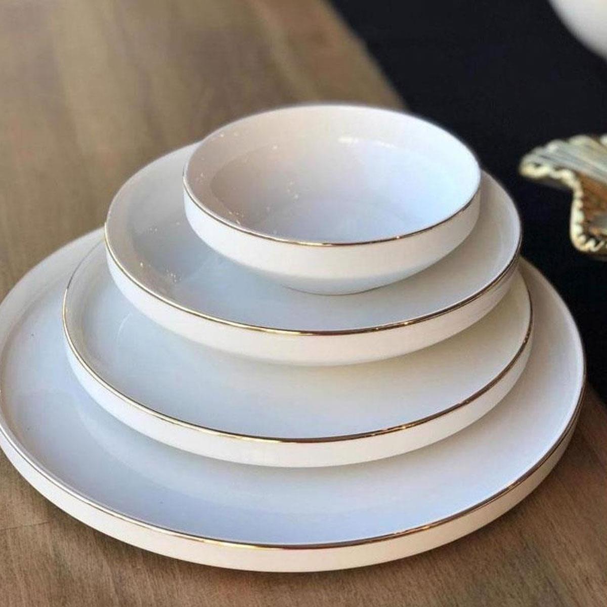 Massimo Pera Gold 24 parça yemek takımı. Sade beyaz porselen, ince gold yaldız kenar detaylı, 6 kişilik bone china sofra seti. (MS-2426)