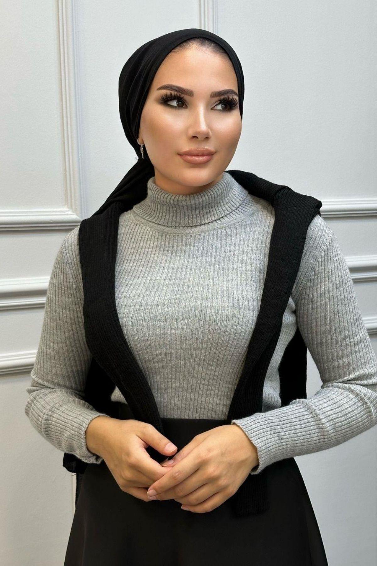 سترة صياد السمك المحبوكة باللون الرمادي