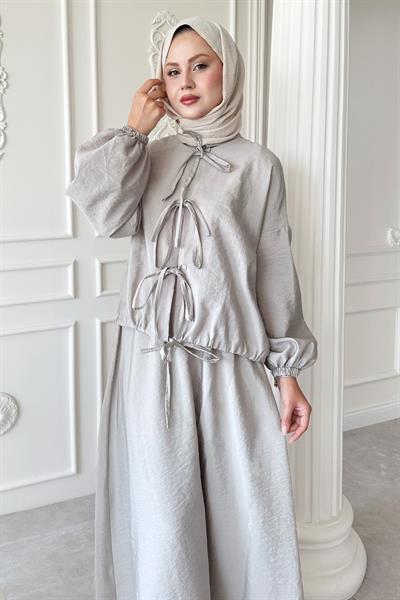 Bağ Detay Etekli Taş Takım