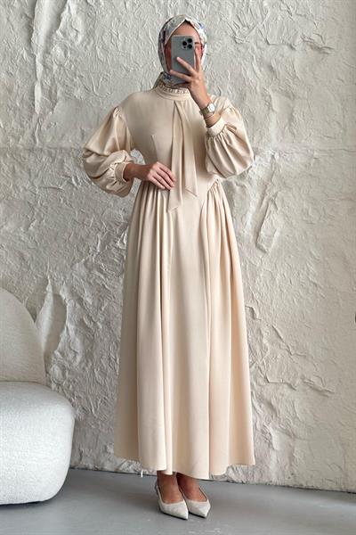 Yakası Kuşaklı Kolları Balon Bej Elbise