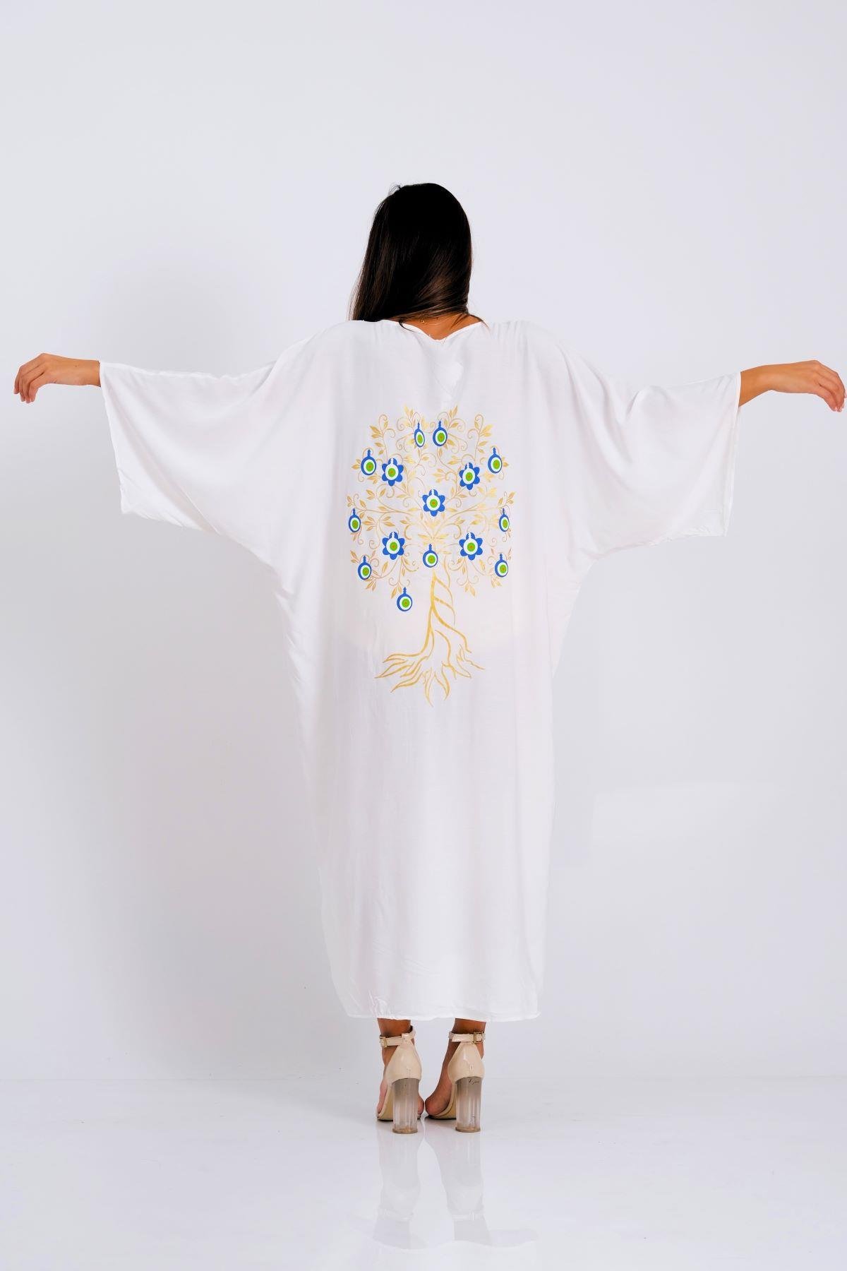 فستان أبيض بفتحة رقبة على شكل حرف V بقميص طويل على شكل حرف V برقبة على شكل حرف V مع ظهر مطبوع بخرز منقوش على شكل عين شريرة وجيوب 