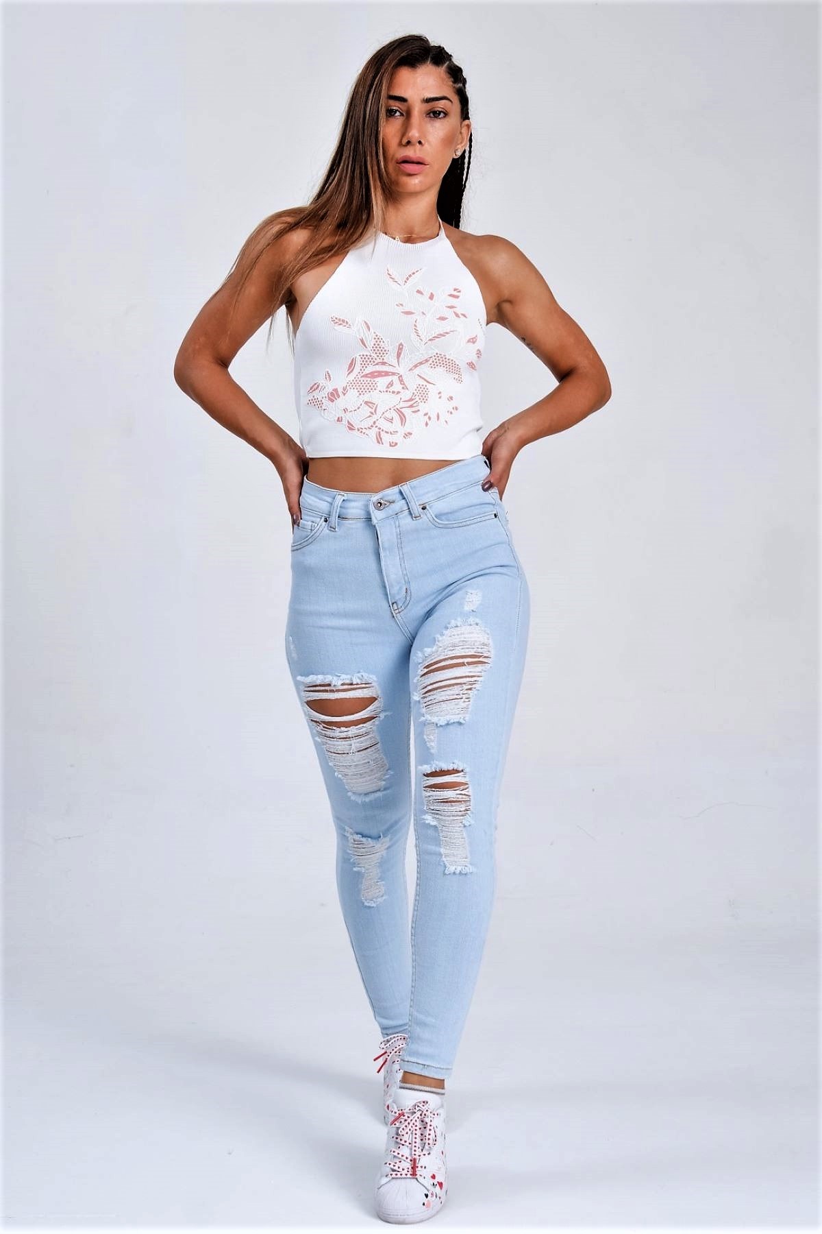 بنطلون جينز سكيني أزرق مفصل ممزق مفصل