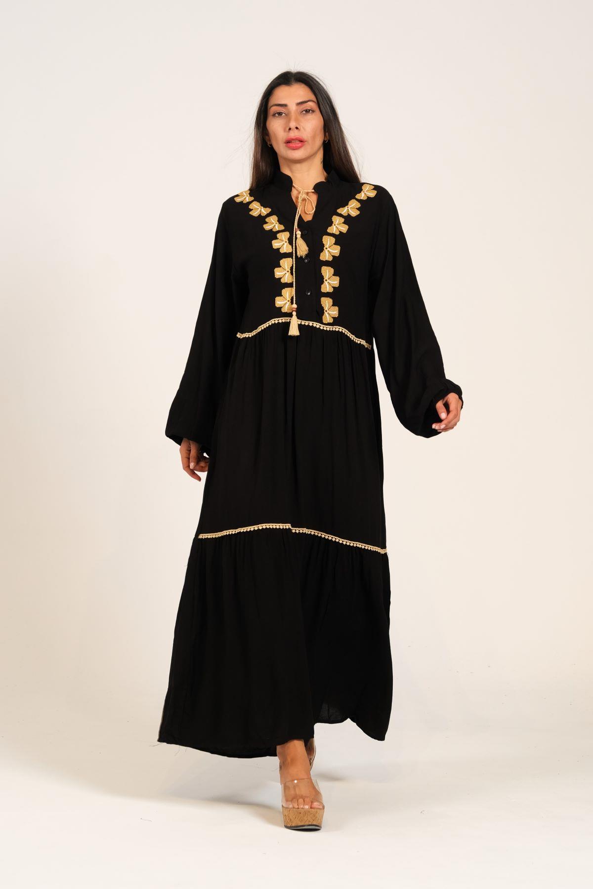 Siyah Balon Kollu Önü Yonca Nakışlı Püsküllü Eteği Kat Kat Uzun Elbise