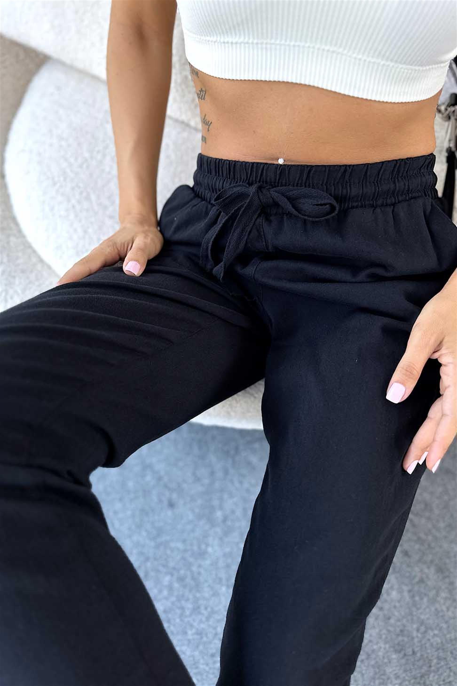Beli Lastik ve İpli Püskül Detay Gabardin Pantolon Siyah
