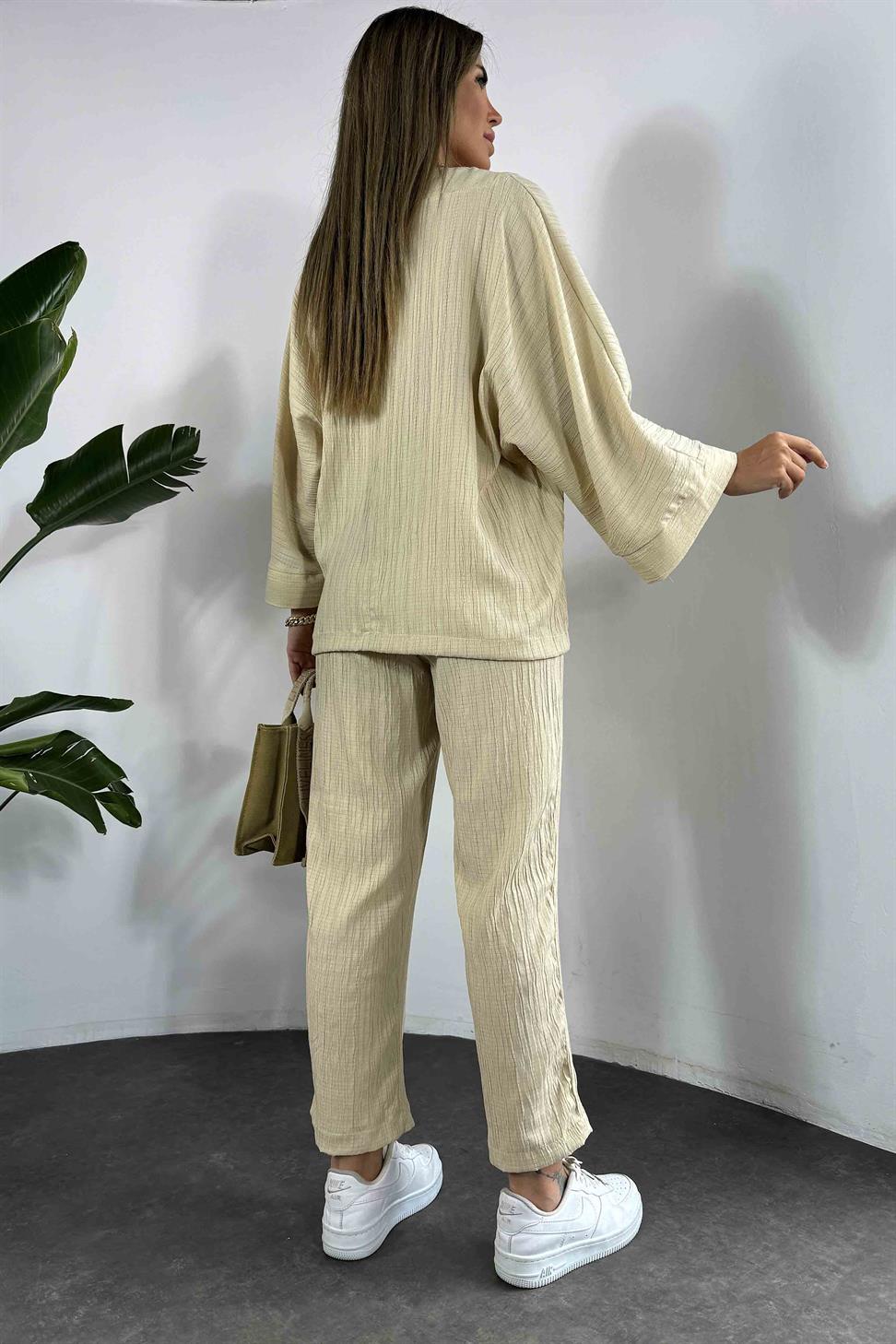 Gofre Kumaş V Yakalı Yarasa Kol Takım Taş