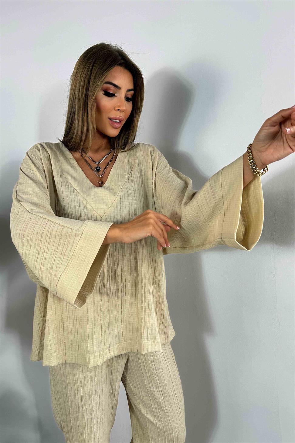 Gofre Kumaş V Yakalı Yarasa Kol Takım Taş