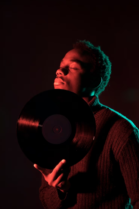 vinyl_holding_man
