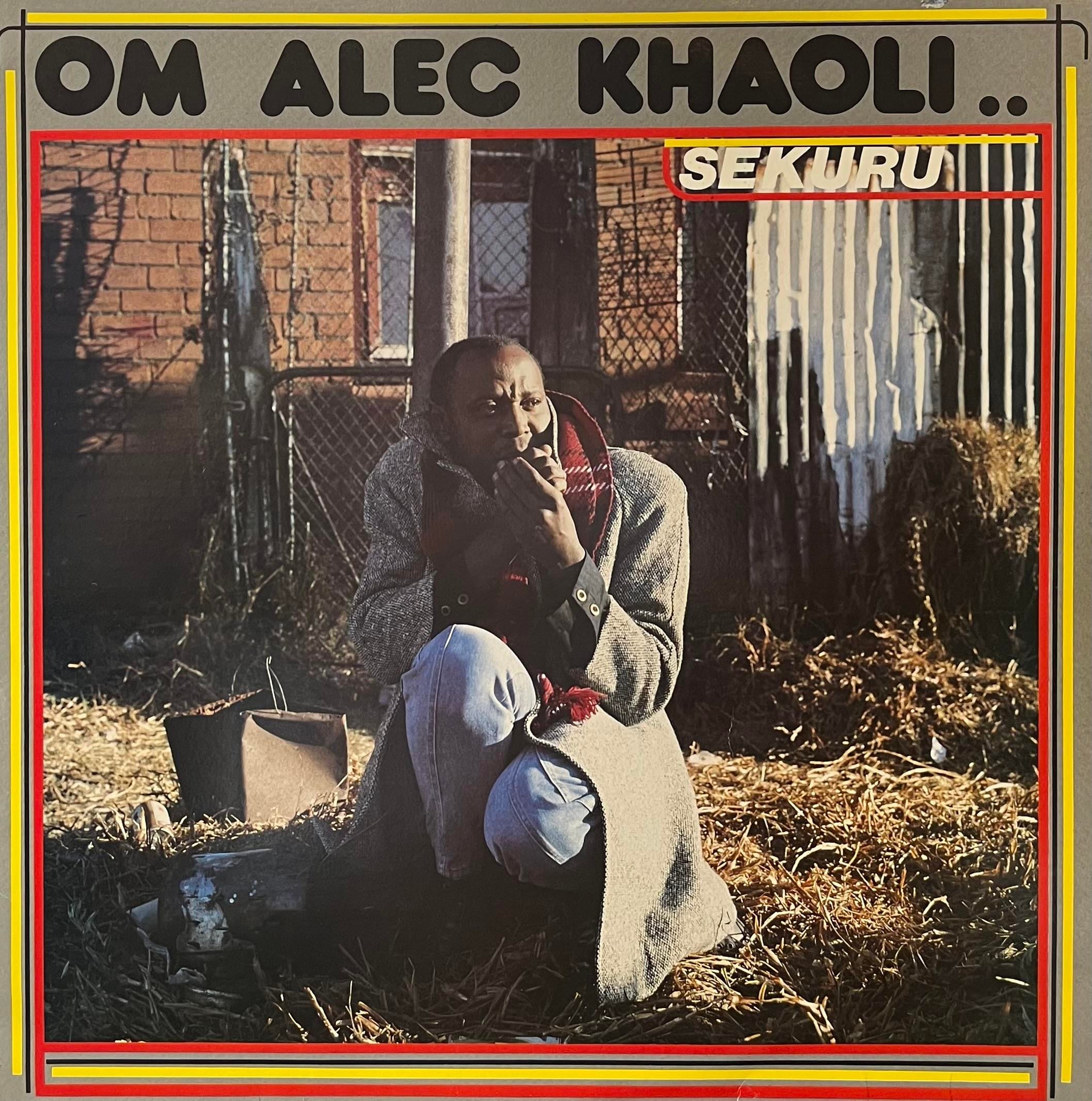 OM ALEC KHAOLI – SEKURU
