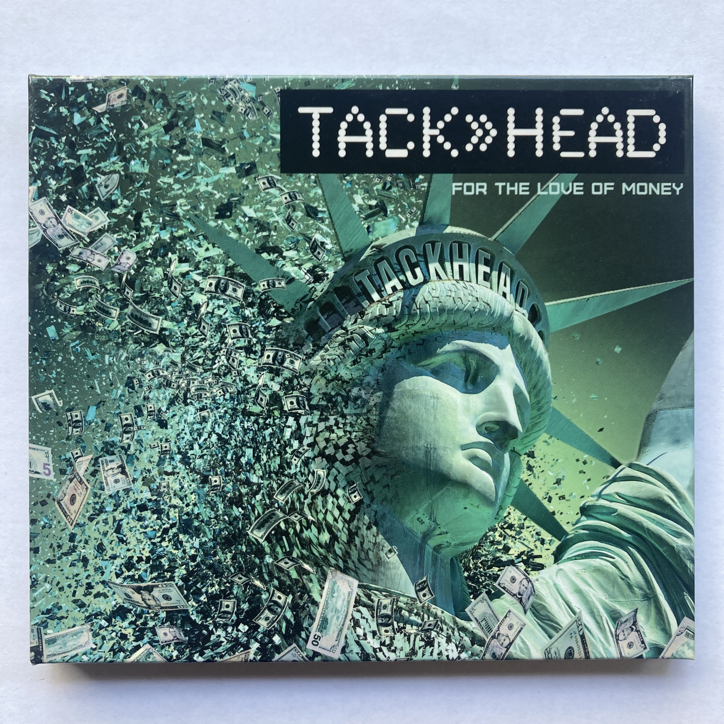 TACKHEAD – FOR THE LOVE OF MONEY