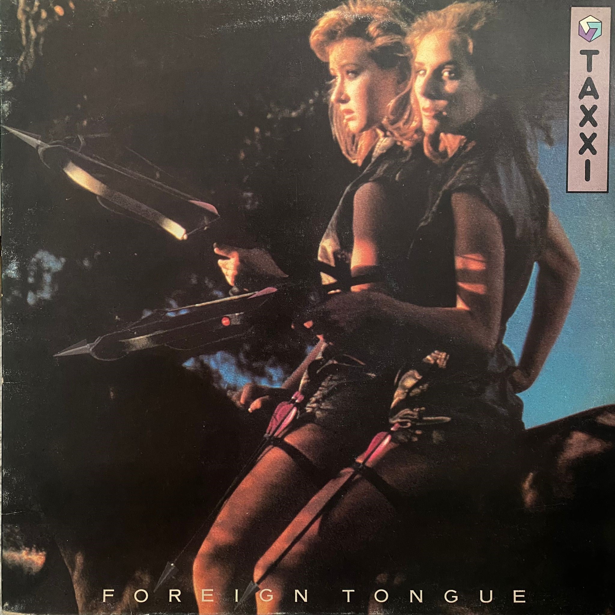 TAXXI - FOREIGN TONGUE