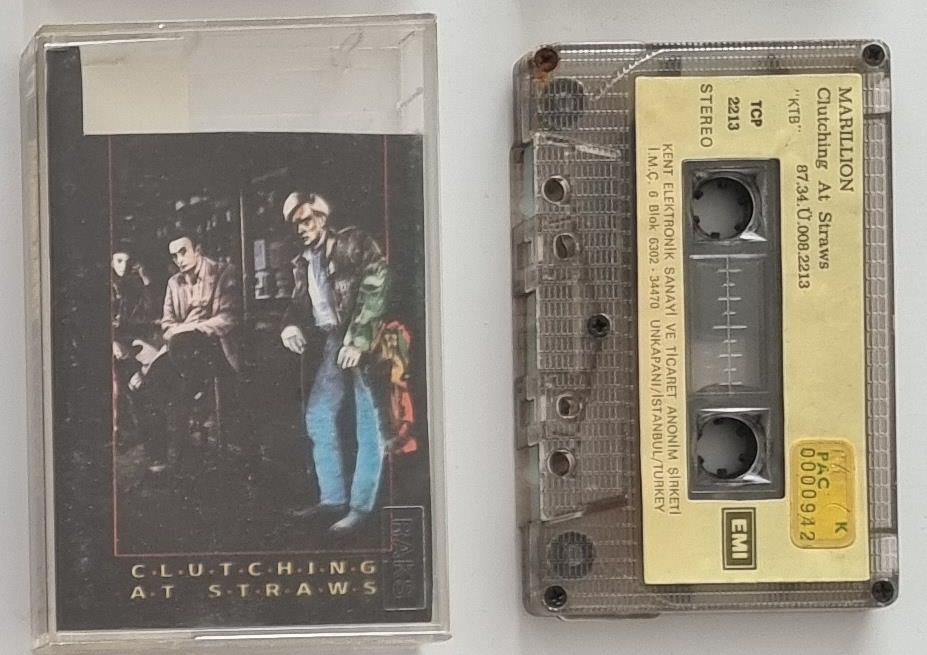 MARILLION - CLUTCHING AT STRAWS