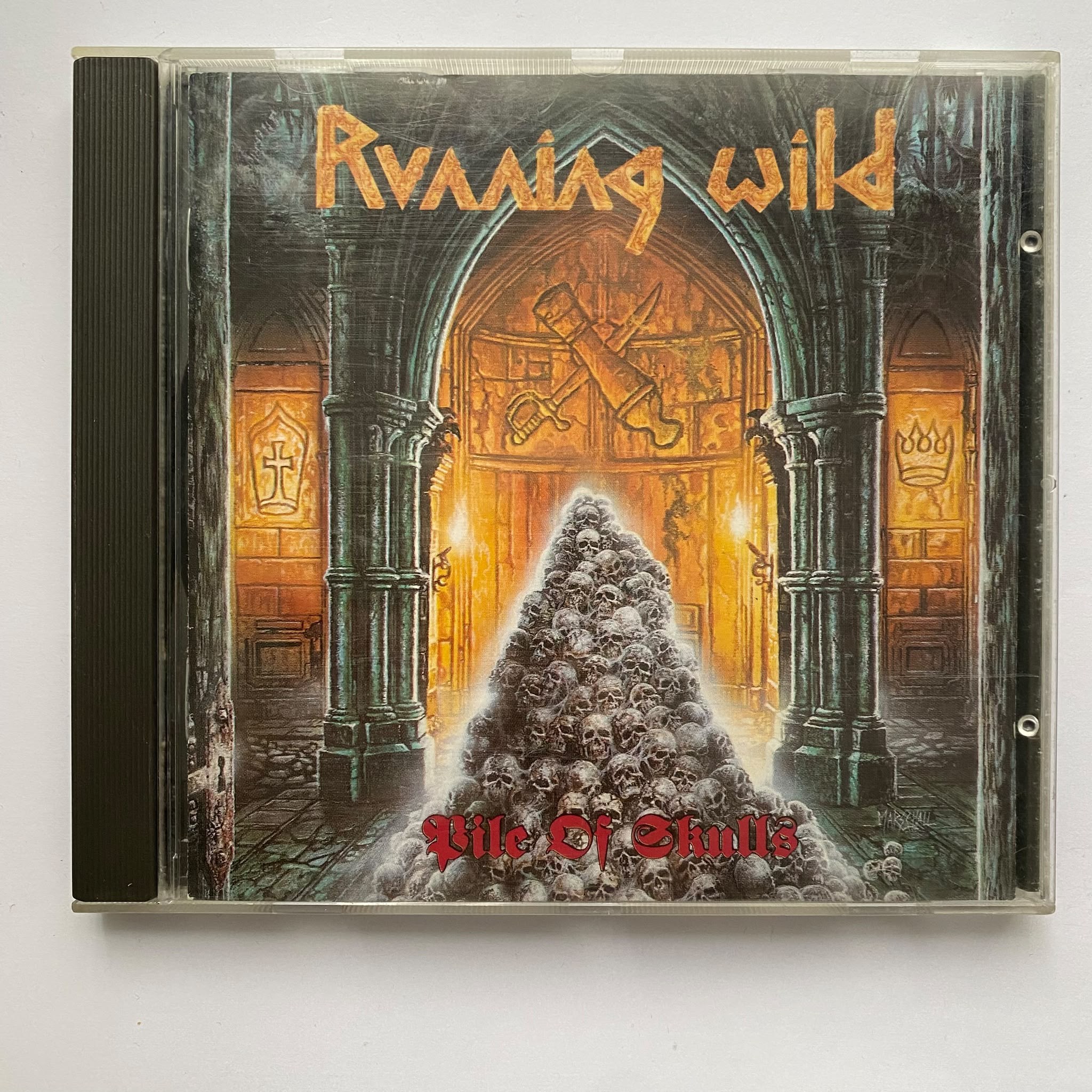 RUNNING WILD - PILE OF SKULLS