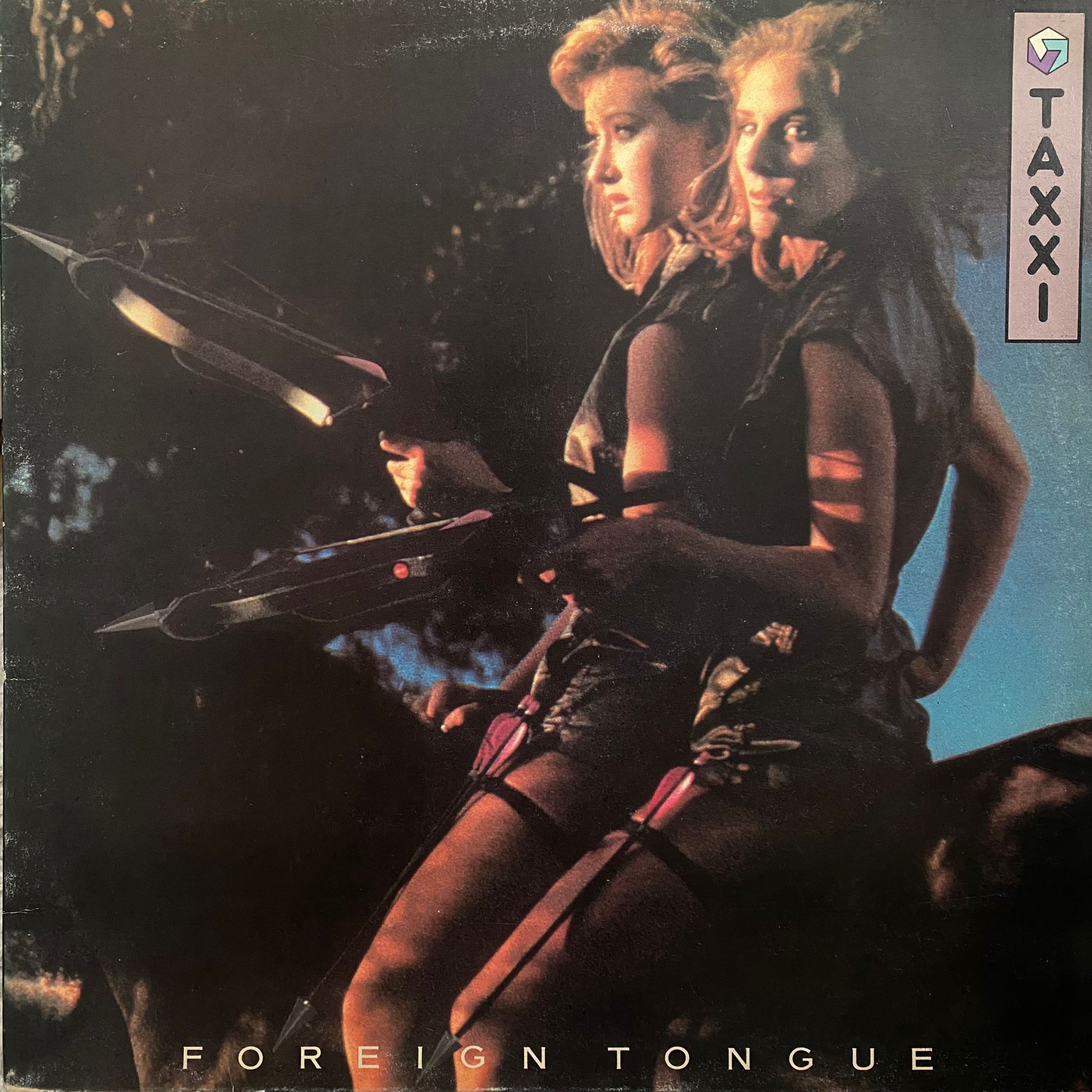 TAXXI - FOREIGN TONGUE