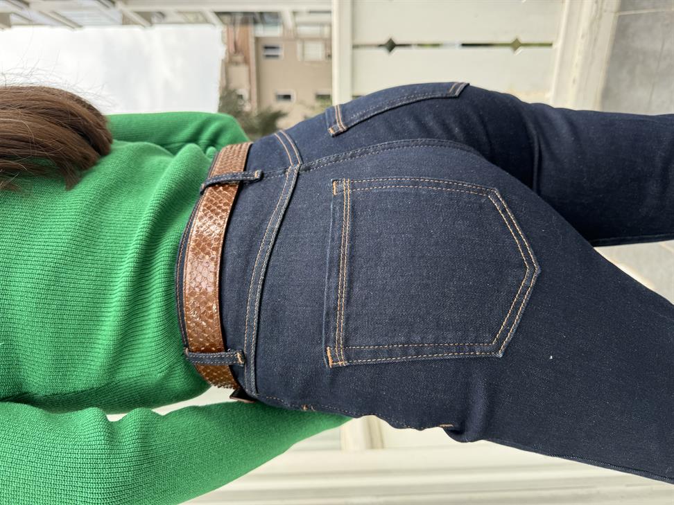 Koyu Mavi Paçası Püsküllü ve Yırtmaçlı Jean Pantolon