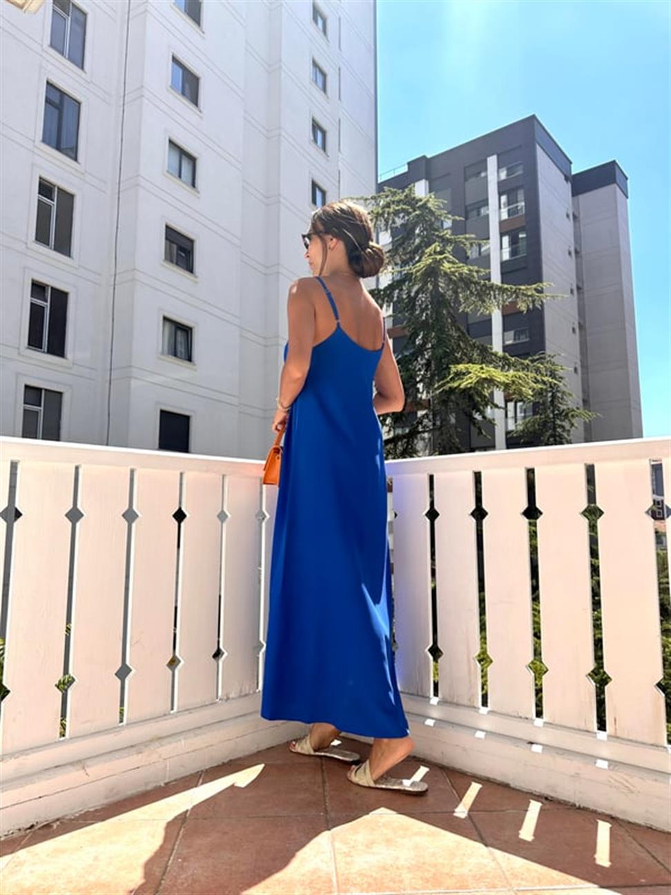 Saks Mavi Etek Ucu Volanlı Uzun Elbise