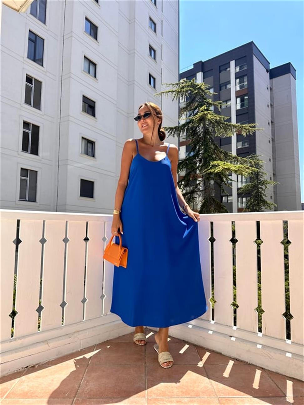 Saks Mavi Etek Ucu Volanlı Uzun Elbise