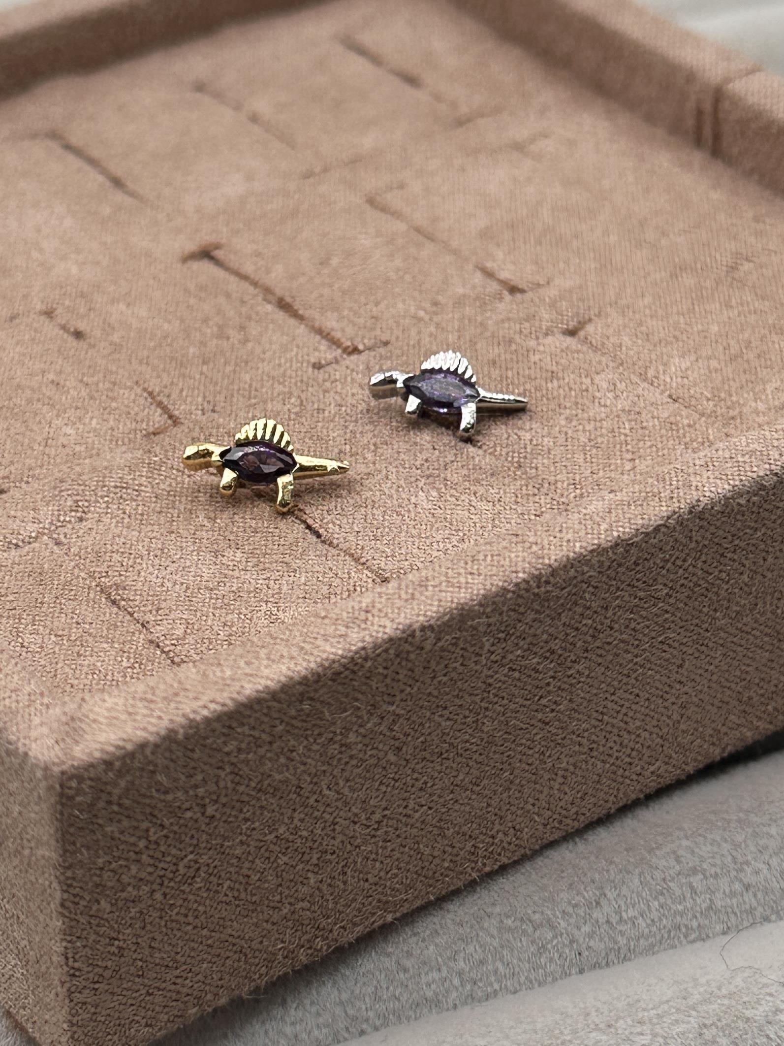 DINOSAUR TRAGUS PIERCING 