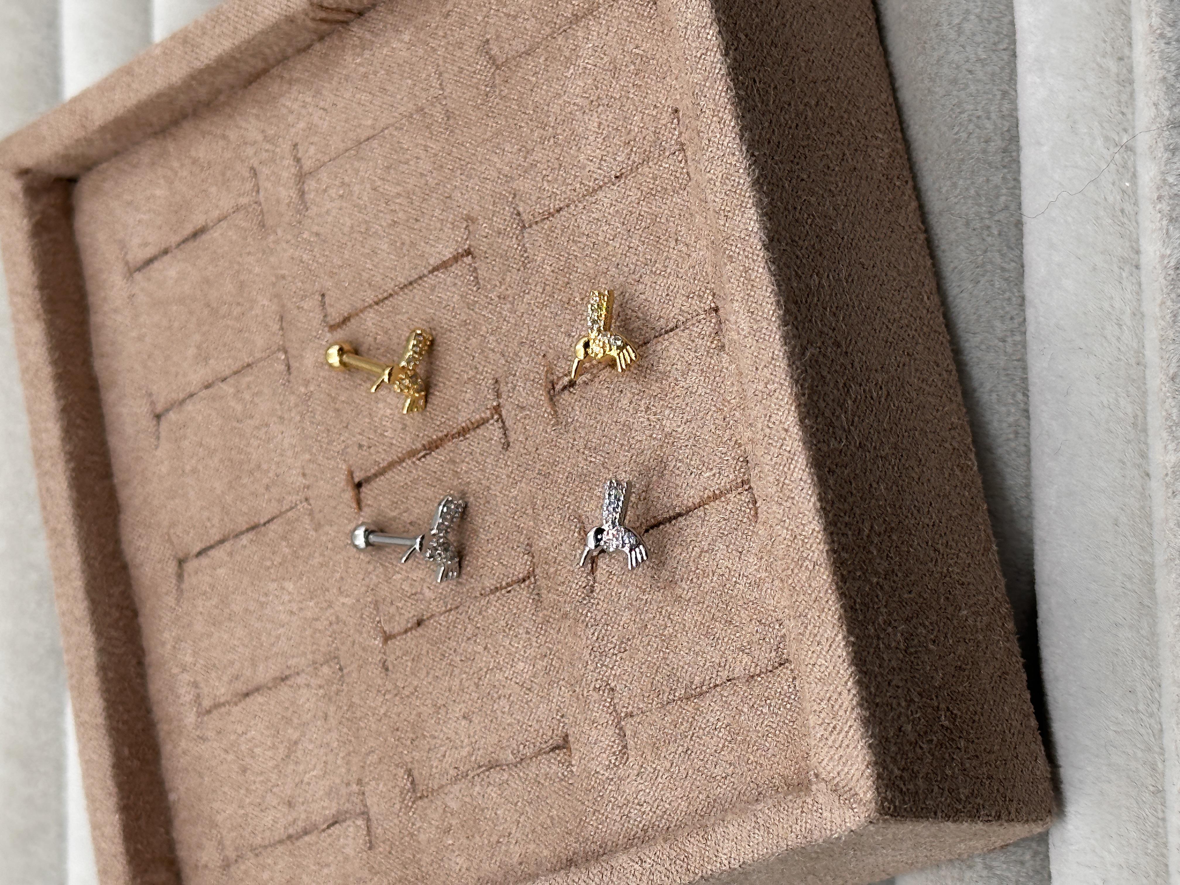 BIRD TRAGUS PIERCING 