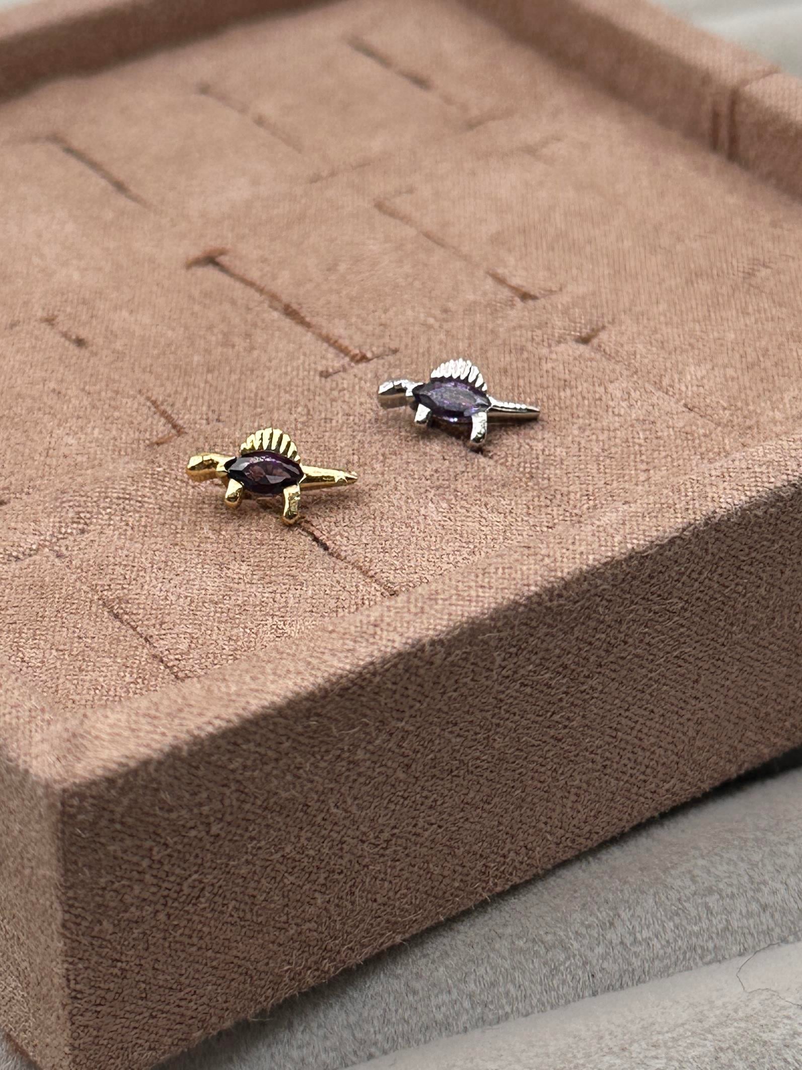 DINOSAUR TRAGUS PIERCING 