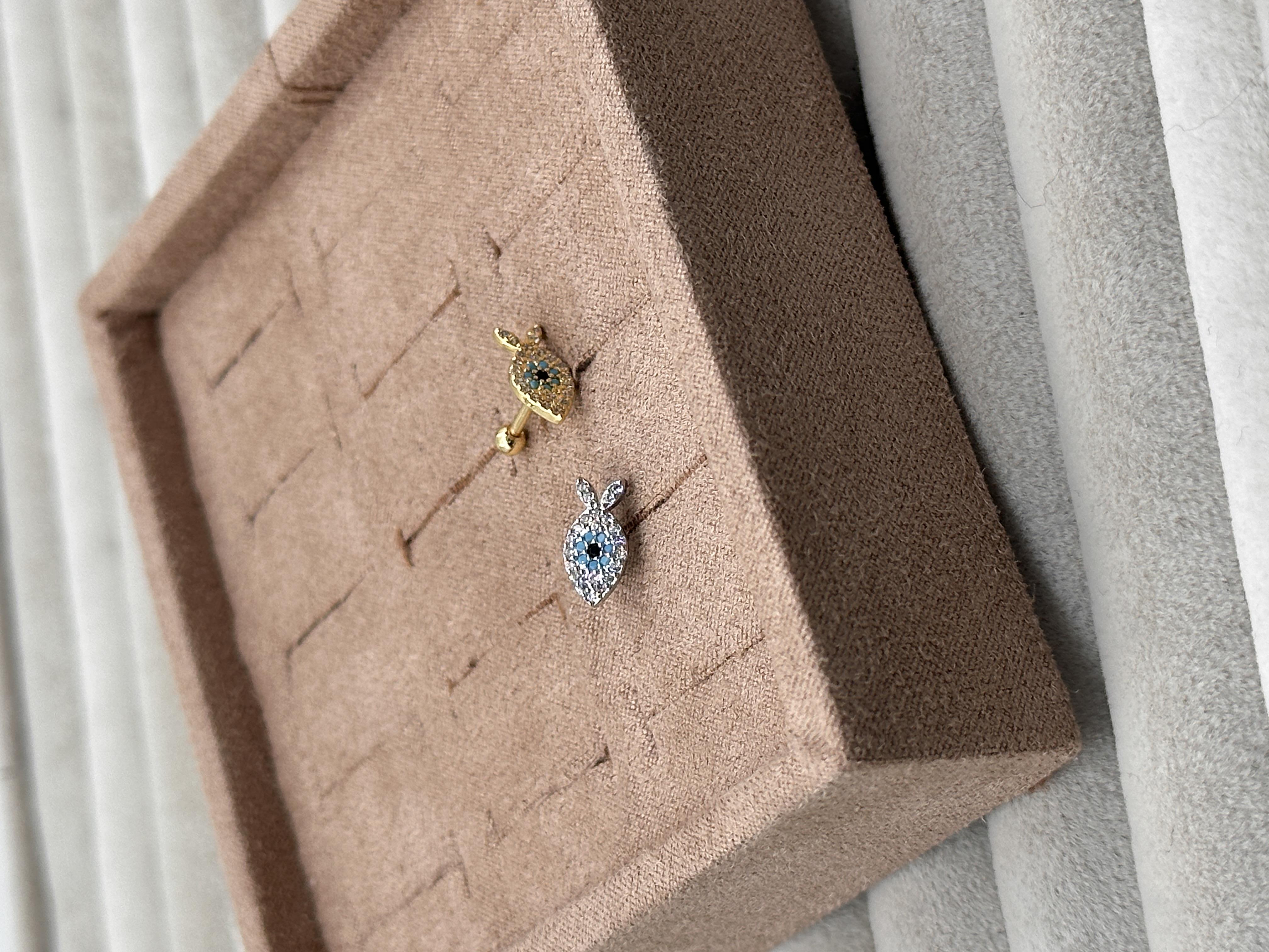 FISH TRAGUS PIERCING 