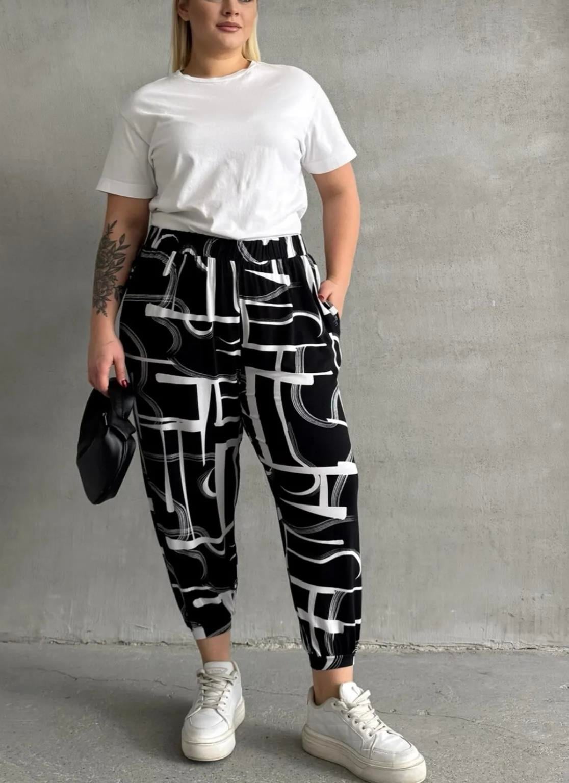 Desenli paça detaylı ince pantolon