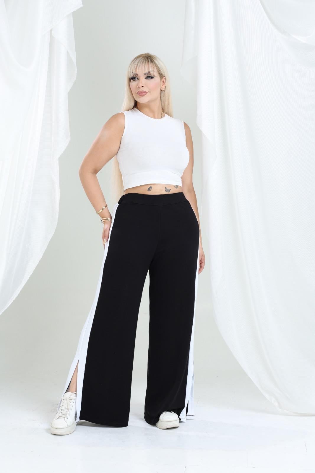 Yırtmaçlı beyaz şeritli eşofman altı 