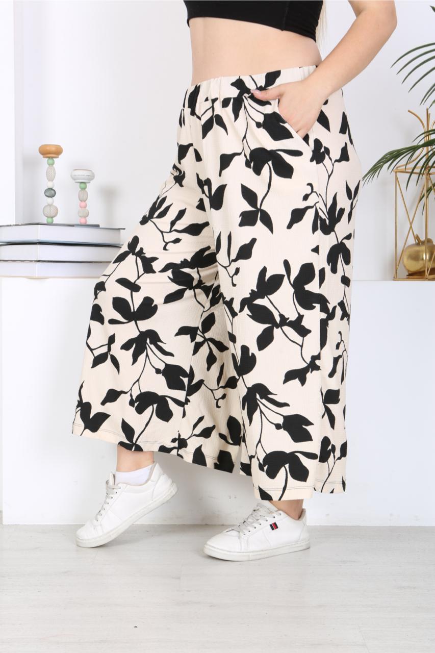 Krem üzeri siyah desenli etek pantolon