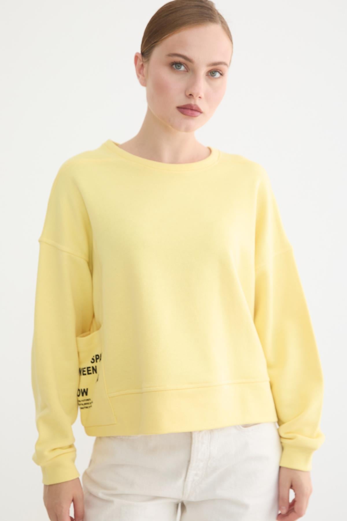 S28-2232-12MarkasızSWEATSHIRTCep Detaylı Kadın Sweatshirt SARI