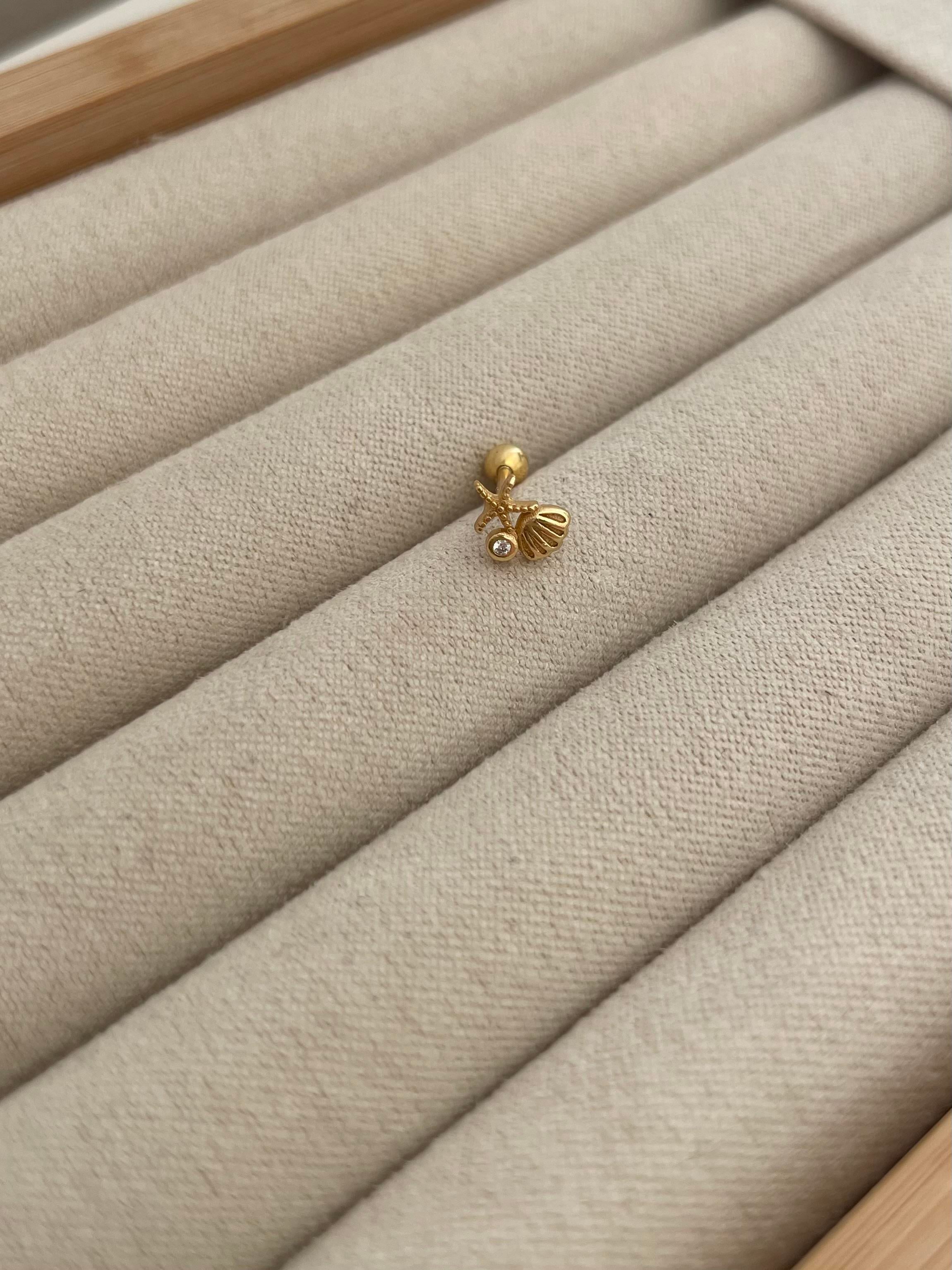 Deniz Kabuklu Piercing
