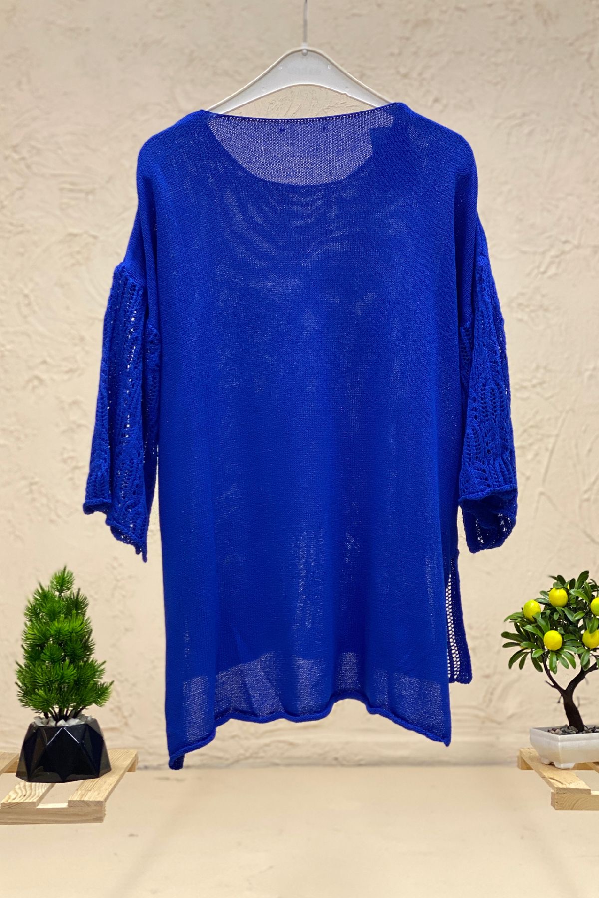 Mercerized blouse with openwork pockets on the sleeves and skirt