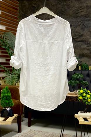 Linen blouse with dominant collar buttons