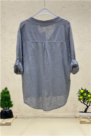 Linen blouse with dominant collar buttons