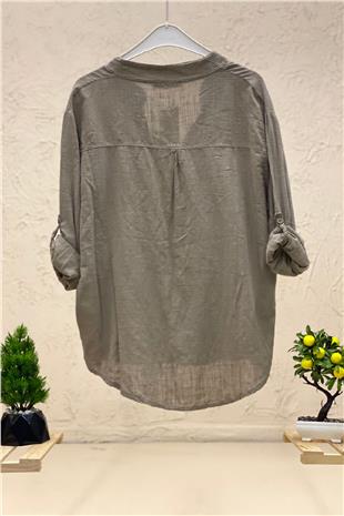 Linen blouse with dominant collar buttons