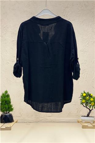 Linen blouse with dominant collar buttons
