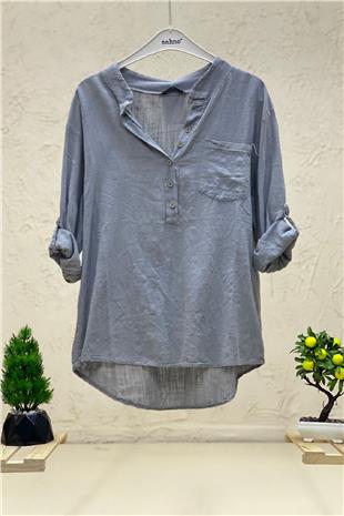 Linen blouse with dominant collar buttons