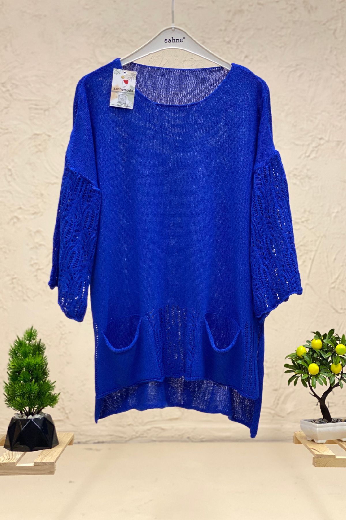 Mercerized blouse with openwork pockets on the sleeves and skirt