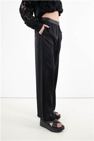 Bel Lastik Detaylı Parlak Kumaşlı Astar Kumaşlı Pantolon