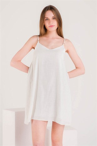 Beyaz Askıları Örgü Sırt Detaylı Mini Keten Elbise ve diğer Elbise modellerimiz için online alışveriş mağazamızı ziyaret edin. 