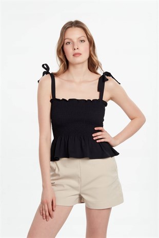 Fırfırlı gipeli ve bağlamalı askılı bluz siyah ve diğer Bluz/Gömlek modellerimiz için online alışveriş mağazamızı ziyaret edin. 