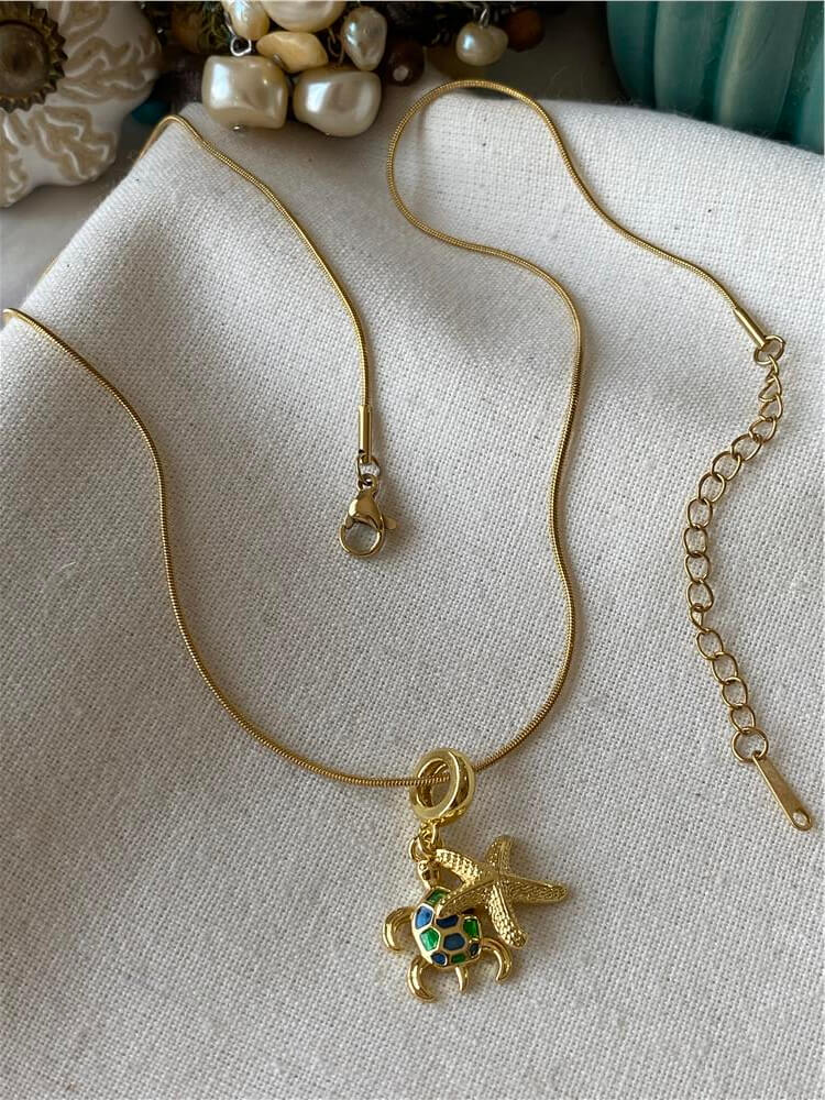 Çelik Denizyıldızı ve Caretta Charmlı Kolye