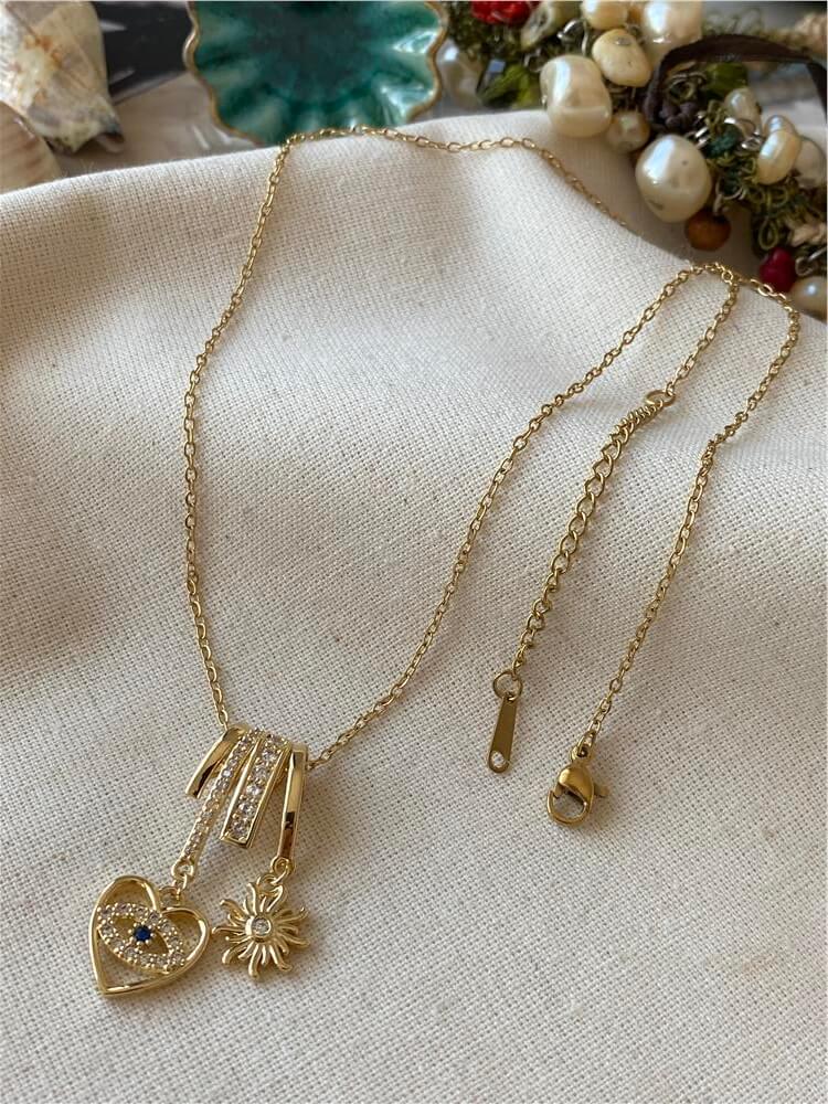 Çelik Gold Güneş ve Kalp Nazar Sallantılı Kolye
